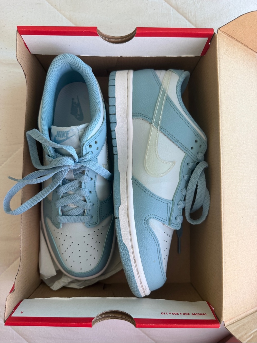 Nike Womens 6.5 Low-Top Sneakers in Light Blue and White with Pale Yellow Swoosh